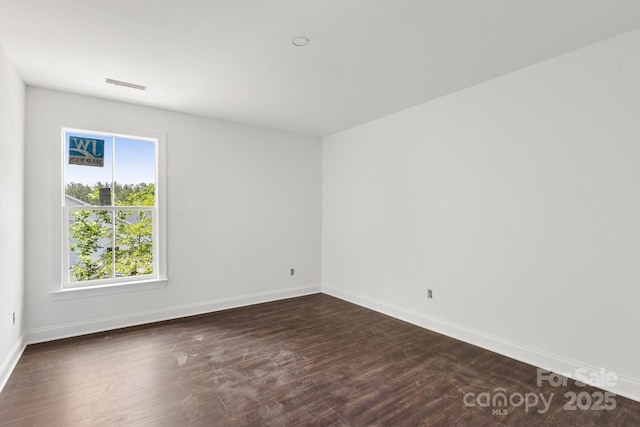 4315 Palm Dr, Denver, NC 28037 - empty room with dark wood-style floors and baseboards