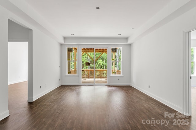4315 Palm Dr, Denver, NC 28037 - empty room featuring dark wood-type flooring and baseboards