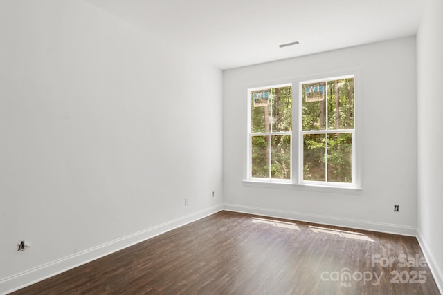 4315 Palm Dr, Denver, NC 28037 - empty room with dark wood finished floors and baseboards