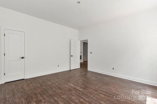 4315 Palm Dr, Denver, NC 28037 - spare room with dark wood-style flooring and baseboards