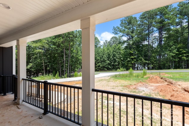 4315 Palm Dr, Denver, NC 28037 - covered porch with view of scattered trees