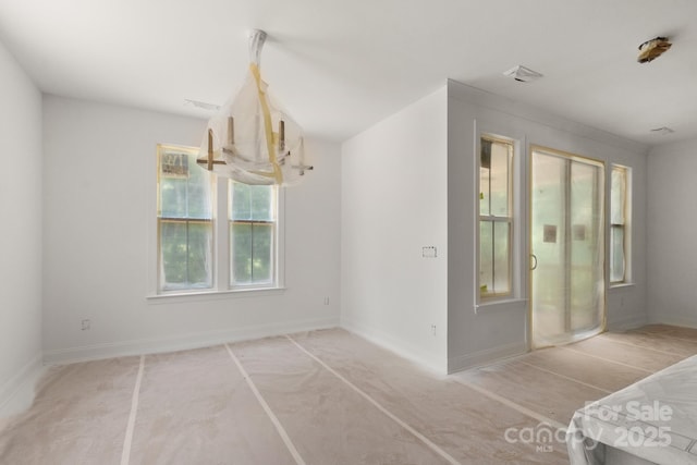 4315 Palm Dr, Denver, NC 28037 - spare room featuring baseboards