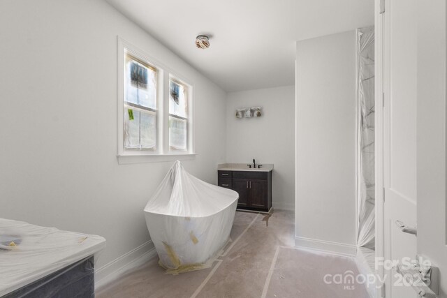 4315 Palm Dr, Denver, NC 28037 - full bath with vanity and a freestanding bath