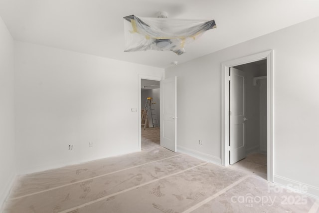 4315 Palm Dr, Denver, NC 28037 - unfurnished bedroom featuring baseboards and ceiling fan