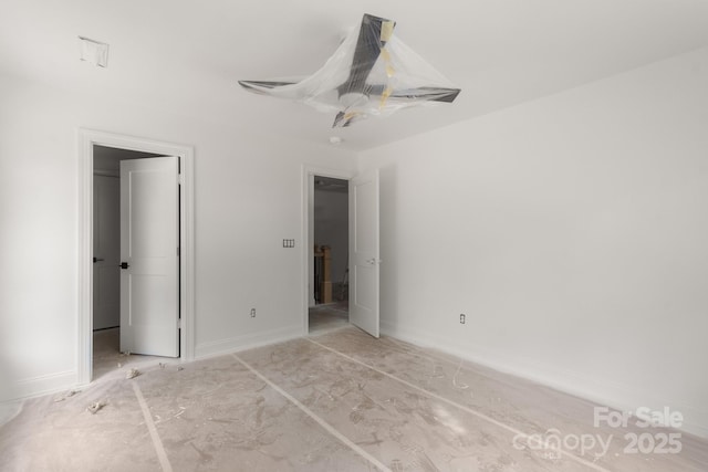4315 Palm Dr, Denver, NC 28037 - unfurnished bedroom featuring baseboards and a ceiling fan