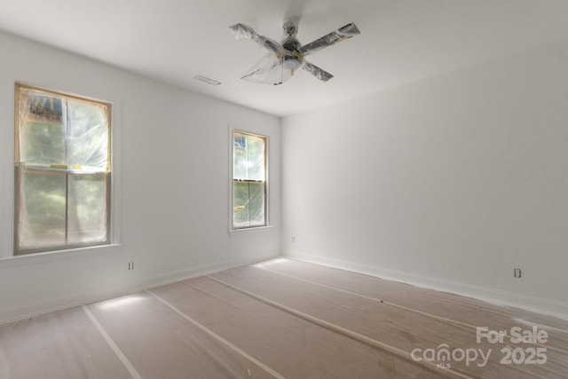4315 Palm Dr, Denver, NC 28037 - empty room featuring a ceiling fan and baseboards