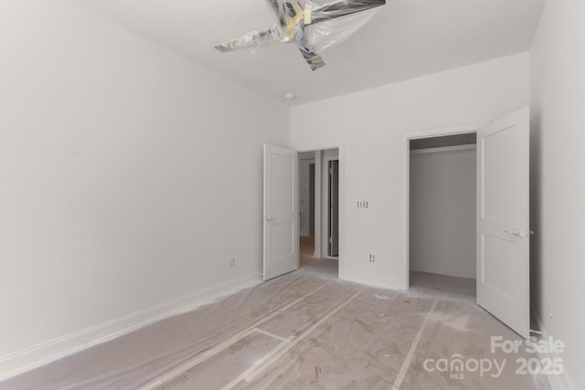 4315 Palm Dr, Denver, NC 28037 - unfurnished bedroom featuring a closet and ceiling fan