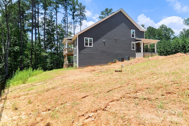 4315 Palm Dr, Denver, NC 28037 - view of side of home with a central air condition unit