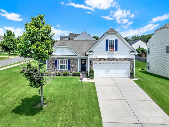 6192 Kilchurn Dr, Fort Mill, SC 29707 - traditional-style home featuring stone siding, concrete driveway, and a front lawn