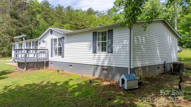 4375 Fox Rd, Lenoir, NC 28645 - view of home's exterior featuring crawl space, cooling unit, a wooden deck, and a yard