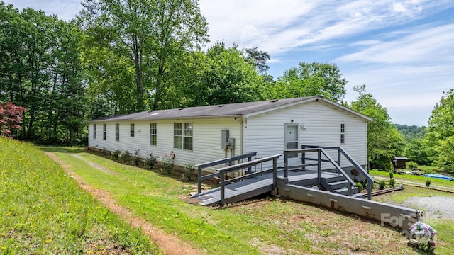 4375 Fox Rd, Lenoir, NC 28645 - rear view of property with a yard