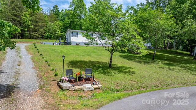 4375 Fox Rd, Lenoir, NC 28645 - view of grassy yard with gravel driveway