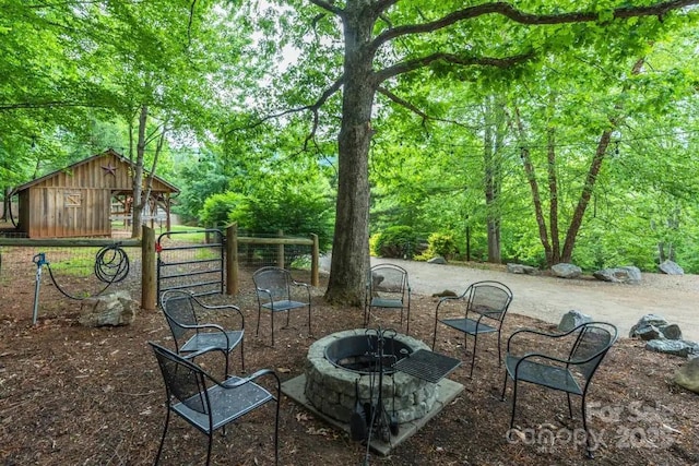 30 Wagon Mountain Dr, Weaverville, NC 28787 - view of patio featuring an outdoor fire pit