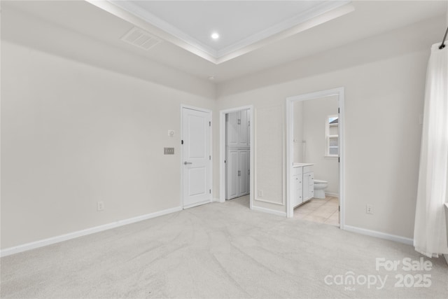 416 Dalton Cir, Fort Mill, SC 29715 - unfurnished bedroom with light carpet, a raised ceiling, baseboards, recessed lighting, and ensuite bath