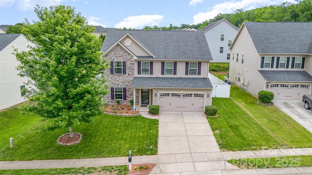 12822 Plumleaf Dr, Charlotte, NC 28213 - view of front of house with driveway, a garage, stone siding, and a shingled roof
