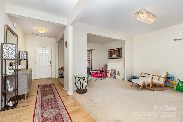 12822 Plumleaf Dr, Charlotte, NC 28213 - entryway featuring light wood-style flooring