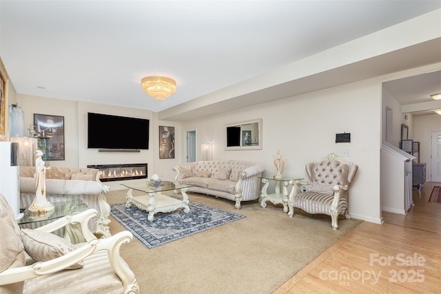 12822 Plumleaf Dr, Charlotte, NC 28213 - living room featuring wood finished floors and baseboards