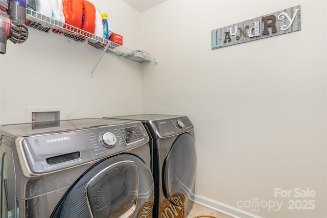 12822 Plumleaf Dr, Charlotte, NC 28213 - laundry area featuring washer and dryer and baseboards