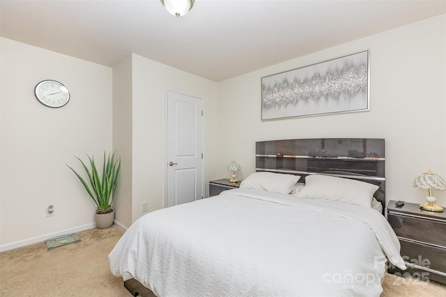 12822 Plumleaf Dr, Charlotte, NC 28213 - carpeted bedroom featuring baseboards