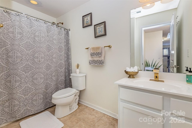 12822 Plumleaf Dr, Charlotte, NC 28213 - bathroom with vanity, tile patterned flooring, toilet, and baseboards