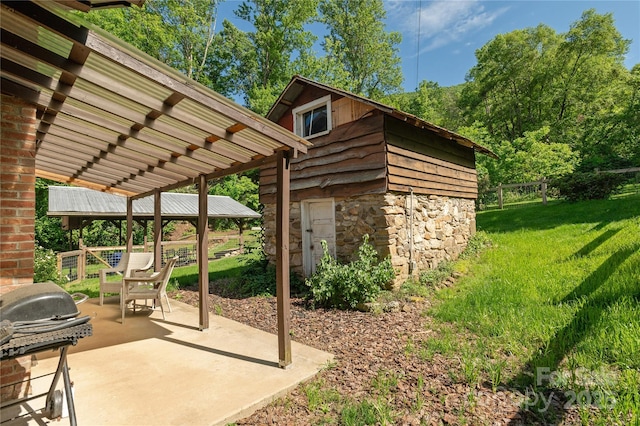 223 Smith Cove Rd, Candler, NC 28715 - view of patio / terrace featuring area for grilling, an outbuilding, a gazebo, and a pergola