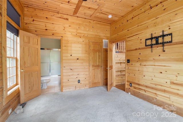 148 Pearl Way, Burnsville, NC 28714 - spare room with wooden walls, carpet, and wooden ceiling