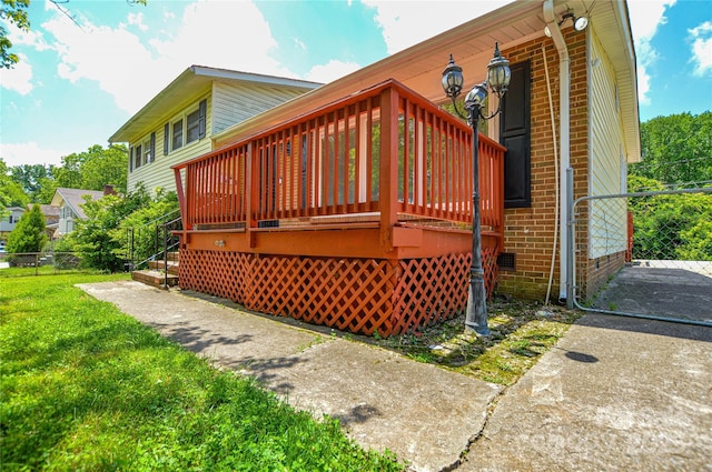 923 Yuma St, Charlotte, NC 28213 - rear view of house featuring a deck and brick siding