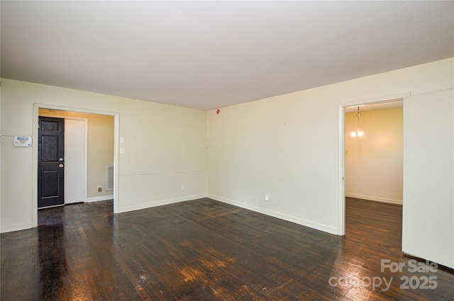 923 Yuma St, Charlotte, NC 28213 - spare room with wood finished floors and baseboards