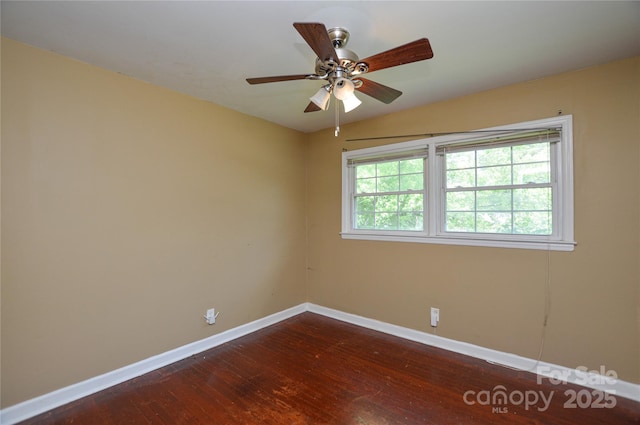 923 Yuma St, Charlotte, NC 28213 - empty room with baseboards, dark wood finished floors, and a ceiling fan