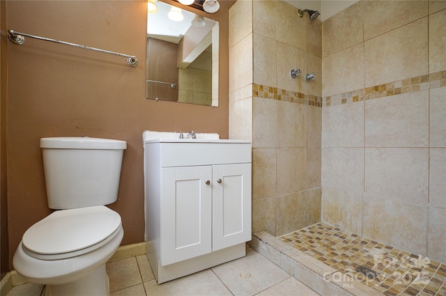 923 Yuma St, Charlotte, NC 28213 - bathroom featuring toilet, tiled shower, tile patterned flooring, and vanity