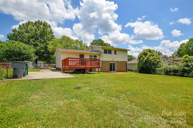 923 Yuma St, Charlotte, NC 28213 - rear view of property featuring a patio, a wooden deck, and a yard