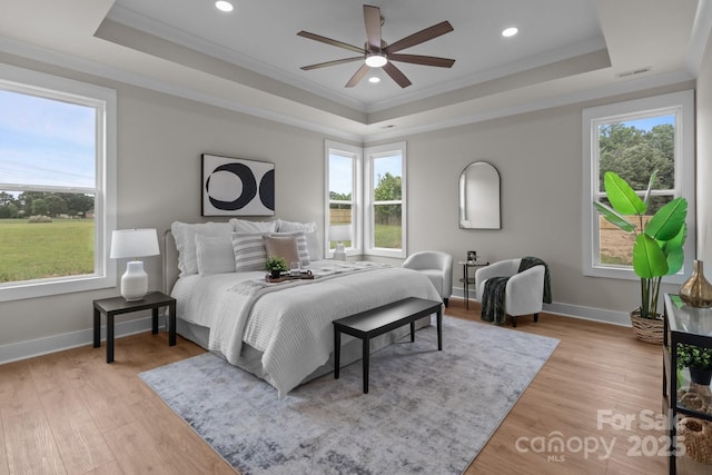 4949 Rimer Rd Unit 4, Concord, NC 28025 - bedroom with a tray ceiling, crown molding, multiple windows, baseboards, and recessed lighting