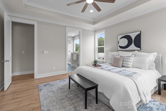 4949 Rimer Rd Unit 4, Concord, NC 28025 - bedroom featuring a tray ceiling, light wood-type flooring, recessed lighting, ornamental molding, and baseboards