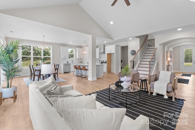4949 Rimer Rd Unit 4, Concord, NC 28025 - living area with light wood-type flooring, stairs, ceiling fan, arched walkways, and recessed lighting