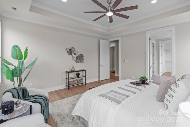 4949 Rimer Rd Unit 4, Concord, NC 28025 - bedroom with a tray ceiling, wood finished floors, recessed lighting, and baseboards