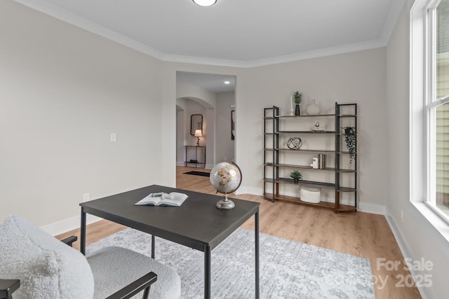4949 Rimer Rd Unit 4, Concord, NC 28025 - office area with arched walkways, light wood-style floors, ornamental molding, and baseboards