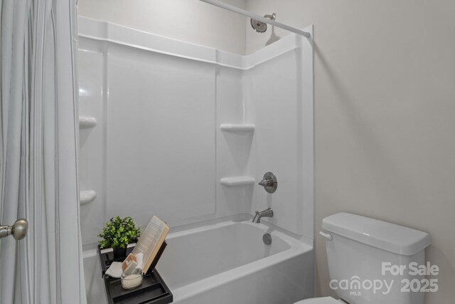 4949 Rimer Rd Unit 4, Concord, NC 28025 - bathroom featuring shower / bath combination with curtain and toilet