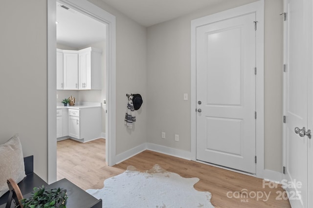 4949 Rimer Rd Unit 4, Concord, NC 28025 - foyer with light wood-type flooring and baseboards