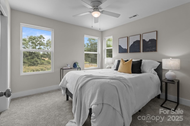 4949 Rimer Rd Unit 4, Concord, NC 28025 - carpeted bedroom featuring baseboards and ceiling fan