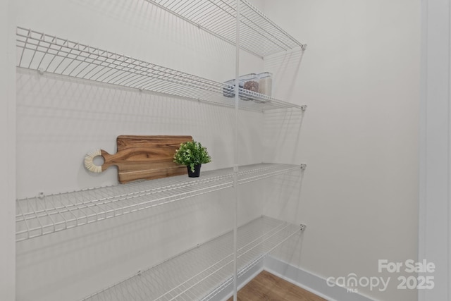4949 Rimer Rd Unit 4, Concord, NC 28025 - walk in closet with wood finished floors