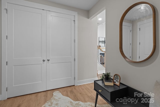 4949 Rimer Rd Unit 4, Concord, NC 28025 - foyer featuring light wood finished floors, baseboards, and arched walkways