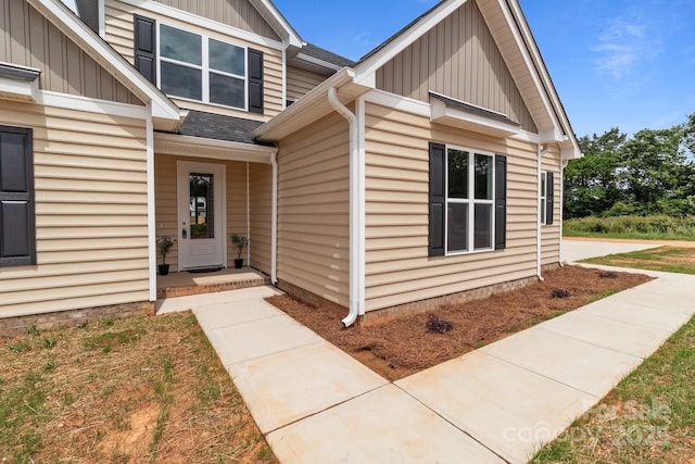 4949 Rimer Rd Unit 4, Concord, NC 28025 - property entrance featuring board and batten siding and roof with shingles