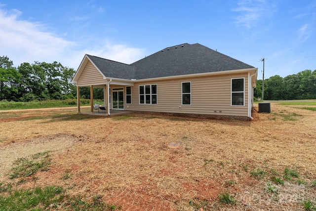 4949 Rimer Rd Unit 4, Concord, NC 28025 - rear view of house with a patio area, central AC unit, and a shingled roof
