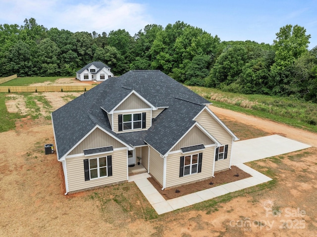 4949 Rimer Rd Unit 4, Concord, NC 28025 - view of front facade featuring roof with shingles and cooling unit