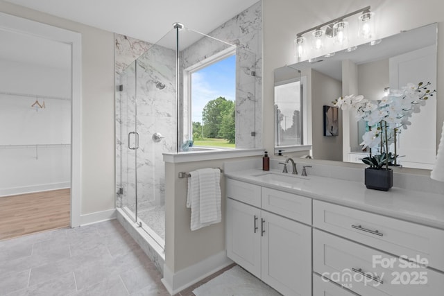 4949 Rimer Rd Unit 4, Concord, NC 28025 - full bath featuring a marble finish shower, vanity, and a walk in closet