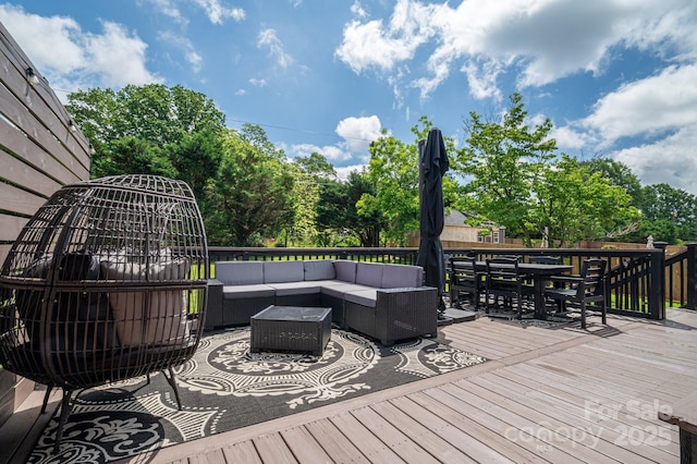 1761 Arden Dr, Lincolnton, NC 28092 - wooden terrace with outdoor lounge area, outdoor dining space, and view of scattered trees
