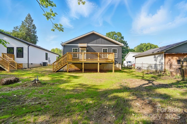 251 Hall Ave NW, Concord, NC 28027 - back of property featuring stairway, a deck, central AC unit, and board and batten siding