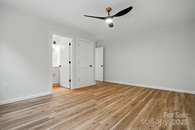 251 Hall Ave NW, Concord, NC 28027 - unfurnished bedroom with light wood-type flooring, ensuite bath, baseboards, and a ceiling fan