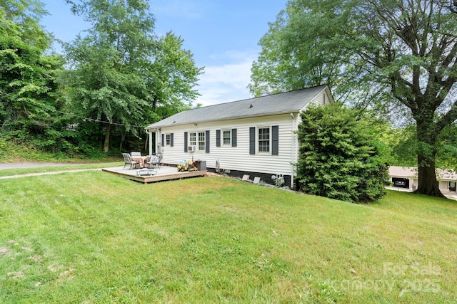 1211 11th St NW, Hickory, NC 28601 - back of house featuring a deck and a lawn