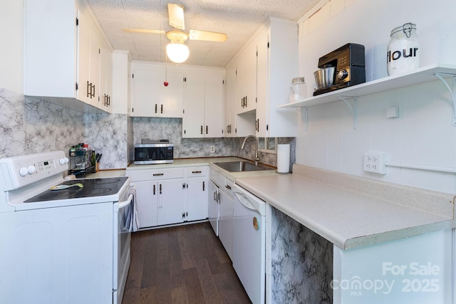 15 Gaddy Rd, Weaverville, NC 28787 - kitchen featuring white appliances, dark wood-style flooring, open shelves, and white cabinetry